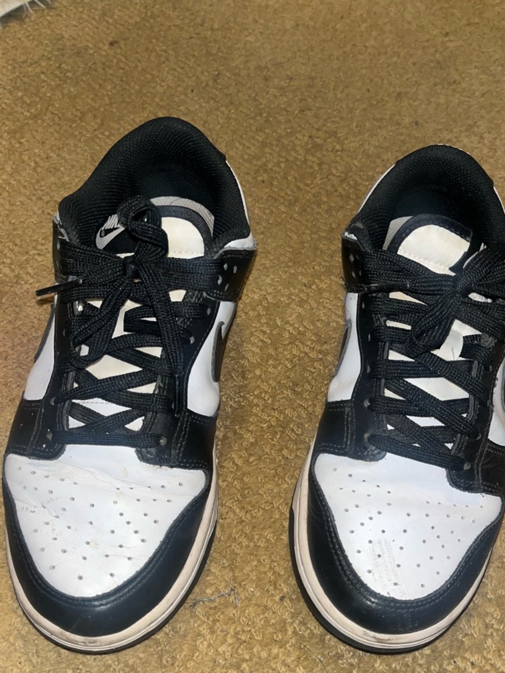 Nike women’s Black & White Low-Top Sneakers